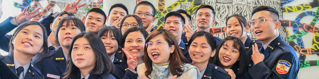 International visitors taking a selfie with ambassador officials