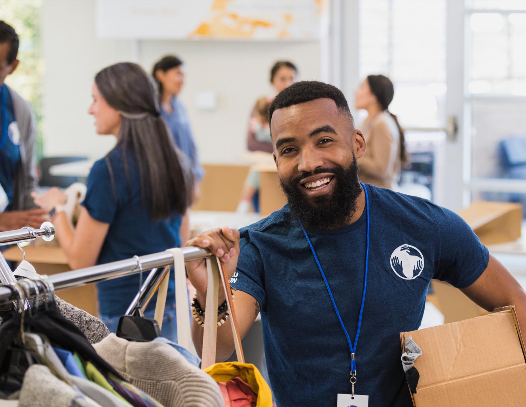 Volunteer helping in a clothes drive