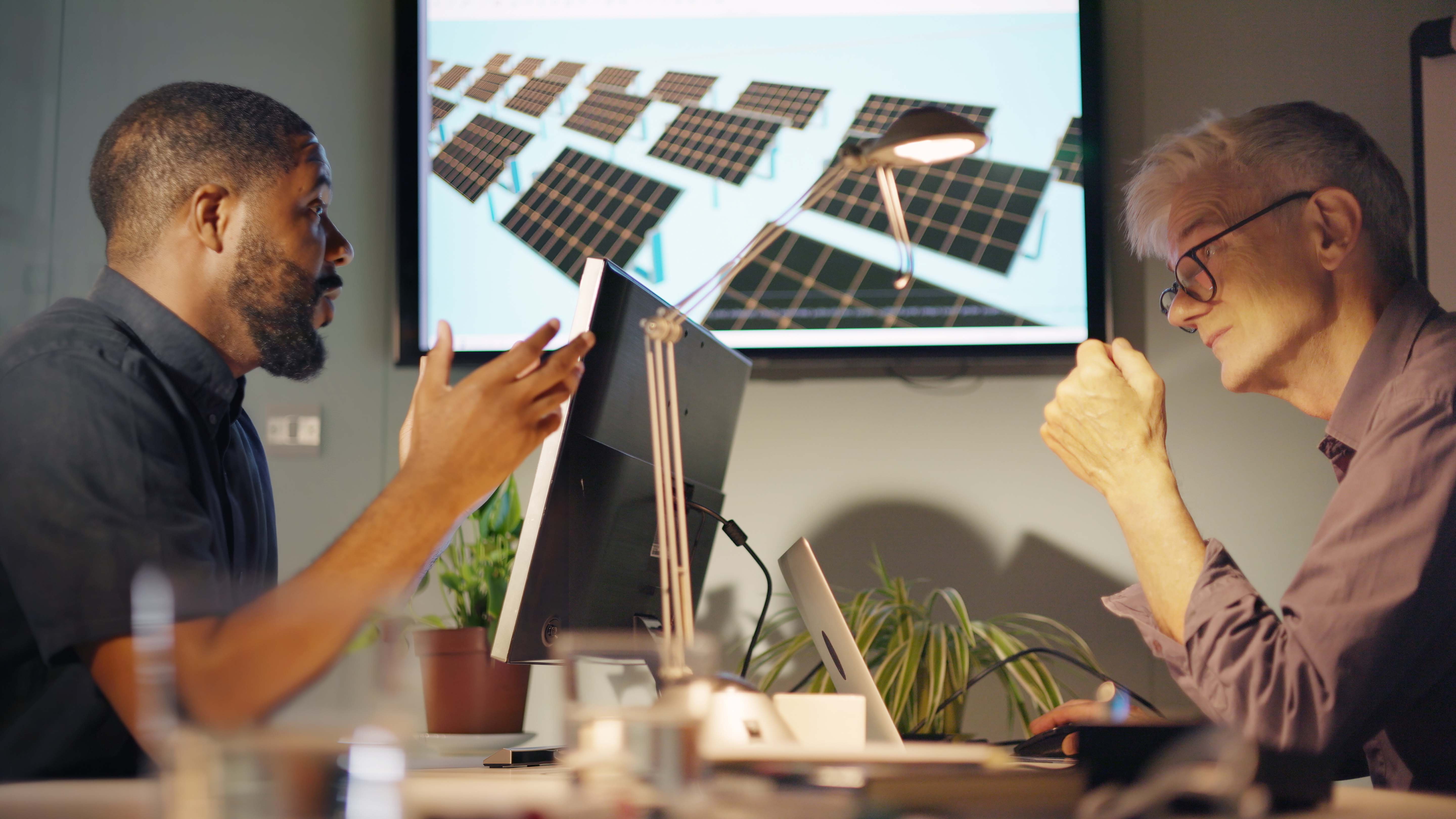 Two individuals researching together