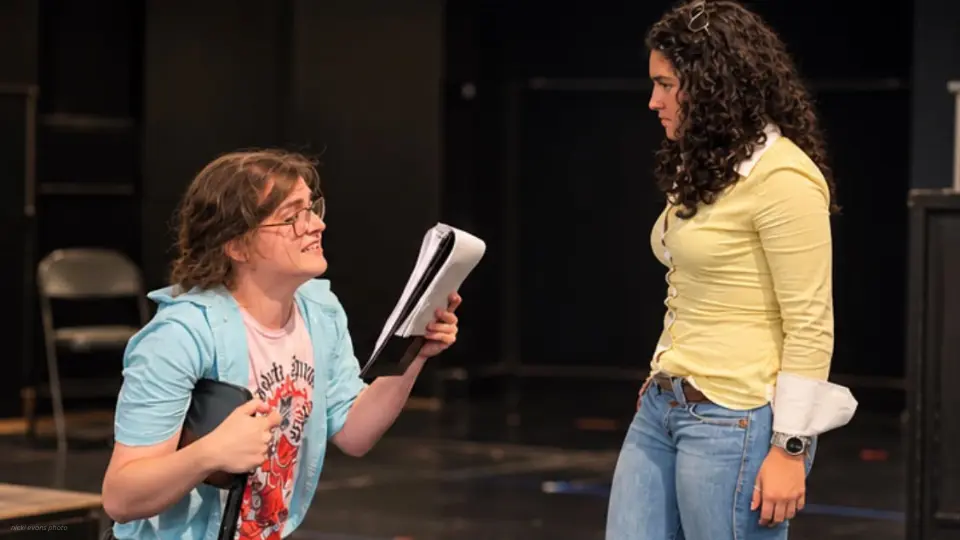 Two female actors on stage