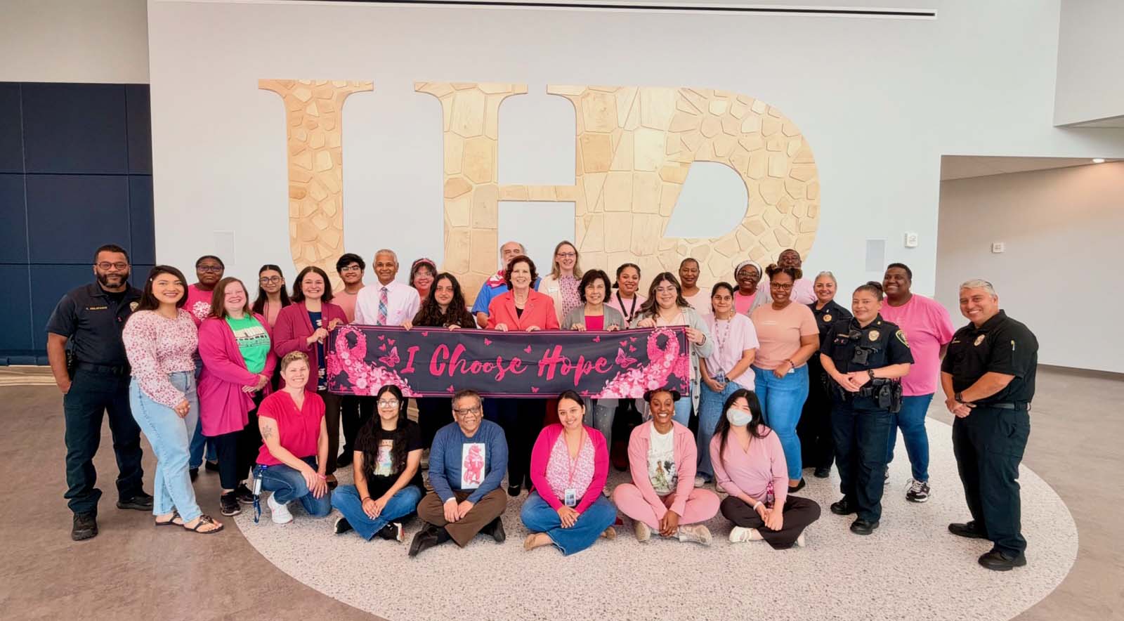 breast cancer walk participants posing
