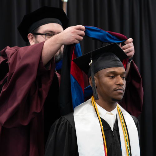 UHD Graduate Student at Hooding Ceremony