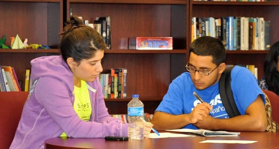 Student taking tutor support Students Studying Together