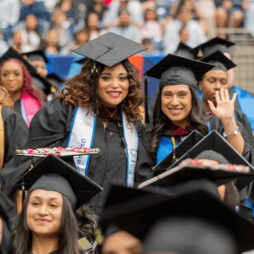 university of houston-downtown graduates wear graduation regalia and wave at the university's 78th commencement ceremonies in spring 2025