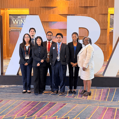 Six University of Houston-Downtown students and members of the university's National Association of Black Accountants with Zoe Smith at the NABA Convention and Expo in Las Vegas Nevada
