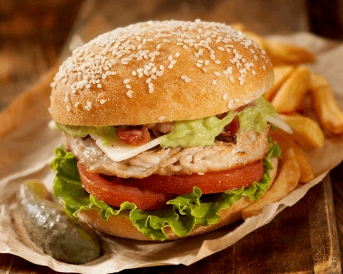 A turkey burger and french fries 