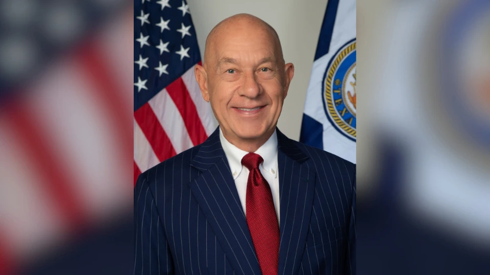 Houston Mayor John Whitmire wears a suit and tie 